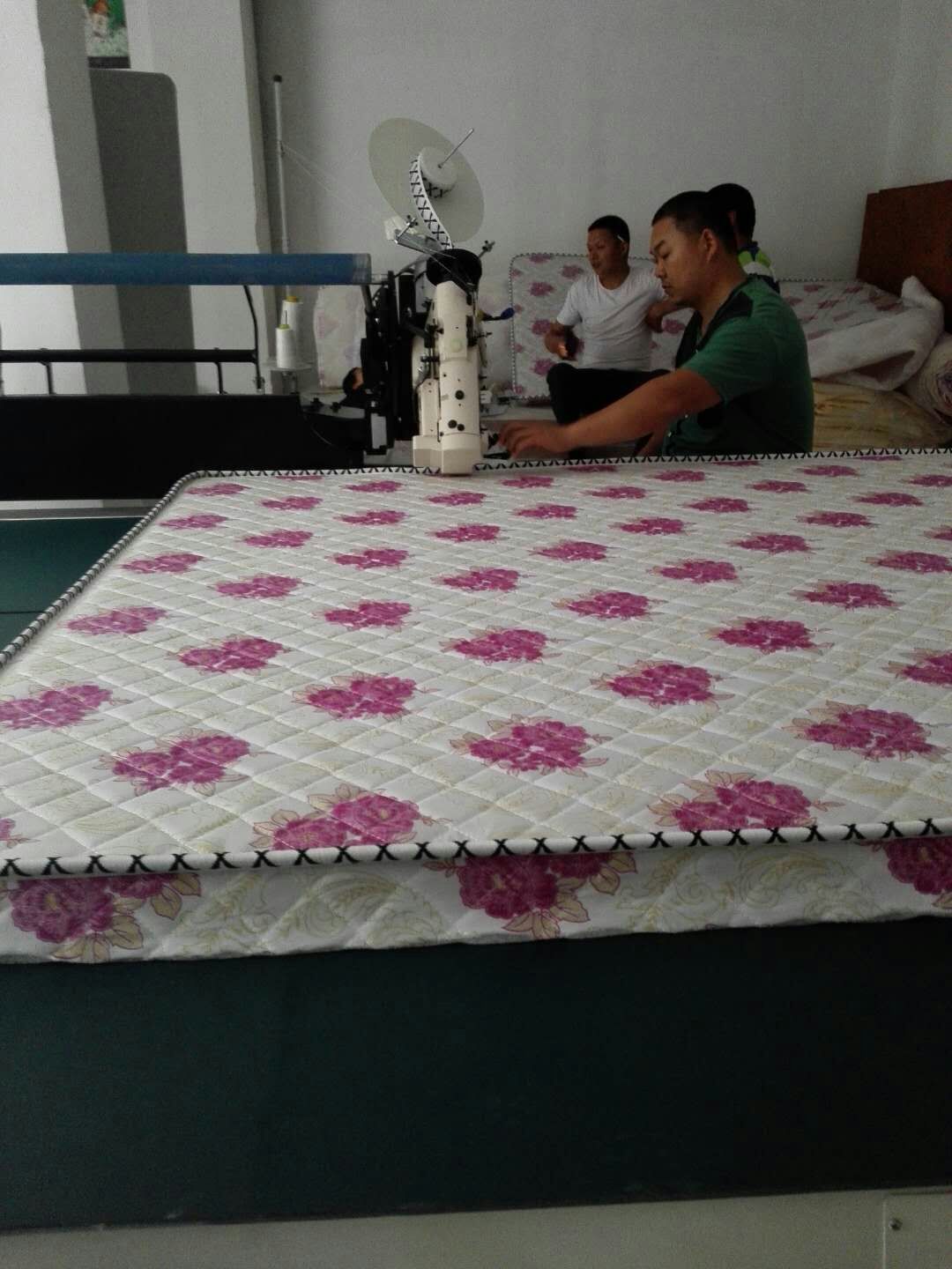 customer tape edging the coir mattress