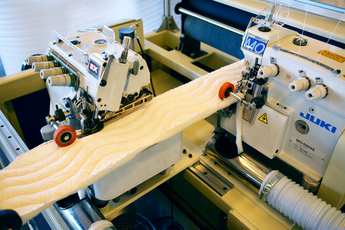 JUKI sewing head on SKB double serging machine.JPG