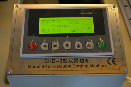 Touch screen control panel on SKB double serging machine.jpg